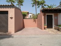 an entrance and garage are open on the patio of this home in the neighborhood of santa ferez,