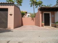 an entrance and garage are open on the patio of this home in the neighborhood of santa ferez,