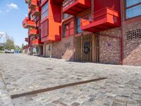 Residential Home in Berlin: Red Cobble Stone Lining the Road