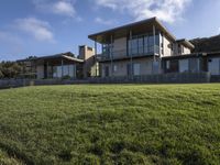 Residential Home with Lawn and Open Green Spaces