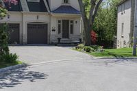 a neighborhood with two rows of houses and trees outside the house is empty from the front door