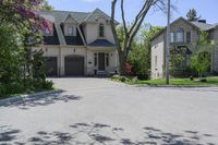 a neighborhood with two rows of houses and trees outside the house is empty from the front door