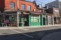 a small business sits in the middle of an urban neighborhood with no traffic, on a street corner