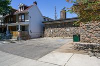 Residential Parking Lot Entry Under Clear Sky