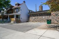 Residential Parking Lot Entry Under Clear Sky