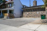 Residential Parking Lot Entry Under Clear Sky