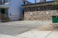 Residential Parking Lot Entry Under Clear Sky