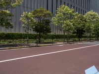 empty road with white lines on the streets of city area against cloudy blue sky on a sunny day