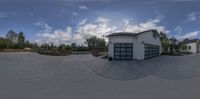 this is a shot of a small skateboard park with a garage that has been set up with a camera