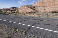 Road on Low Desert Landscape with Asphalt