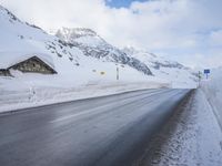 Road with Asphalt: Water and Mountain View