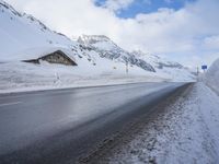 Road with Asphalt: Water and Mountain View