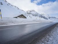 Road with Asphalt: Water and Mountain View