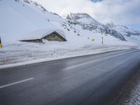 Road with Asphalt: Water and Mountain View