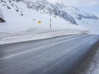 Road with Asphalt: Water and Mountain View