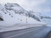 Road with Asphalt: Water and Mountain View