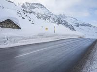 Road with Asphalt: Water and Mountain View