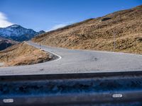 Road Through the European Alps: A Majestic Mountain Landscape