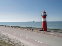 Road Near the Ocean: Horizon and Clear Sky