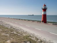 Road Near the Ocean: Horizon and Clear Sky