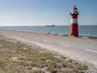 Road Near the Ocean: Horizon and Clear Sky