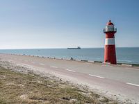 Road Near the Ocean: Horizon and Clear Sky