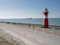 Road Near the Ocean: Horizon and Clear Sky