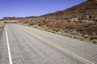 Road through Red Rocks in Hite, Lake Powell, Utah, USA