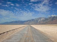 Road, Sky, and Mountain Landscape in California