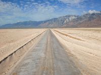 Road, Sky, and Mountain Landscape in California