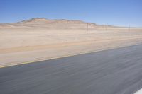 Endless Road through African Desert Landscape