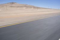 Endless Road through African Desert Landscape