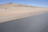 Endless Road through African Desert Landscape