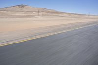 Endless Road through African Desert Landscape