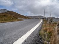 Road Through European Landscape on a Cloudy Day