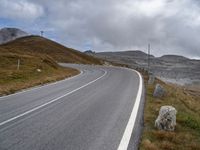 Road Through European Landscape on a Cloudy Day