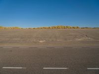 Road through Holland's Coastal Landscape - Stock Photo