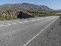 Road Through Iceland: Majestic Mountains and Vast Plains