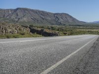 Road Through Iceland: Majestic Mountains and Vast Plains