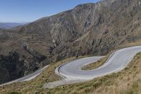 Road through New Zealand Highlands: Exploring the Scenic Landscape