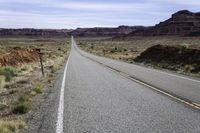 Road Through Utah Desert: A Scenic Mountain Landscape