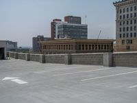 a parking lot and wall are pictured in a photo from the perspective point of view