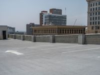 a parking lot and wall are pictured in a photo from the perspective point of view