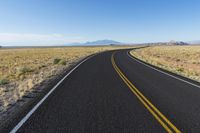 Road through the Utah desert landscape