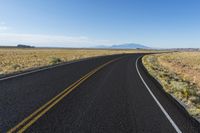 Road through the Utah desert landscape