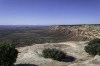 Rock Wall and Asphalt Road: A Scenic View of the Utah Horizon