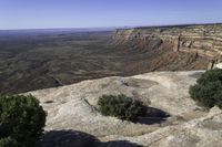 Rock Wall and Asphalt Road: A Scenic View of the Utah Horizon