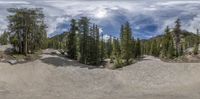 a fisheye view of the valley and some mountains in the background of this image