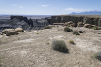 this rock formation looks to be part of a massive canyon on the rim of a mountain