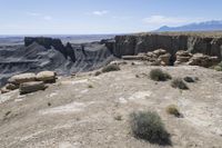 this rock formation looks to be part of a massive canyon on the rim of a mountain